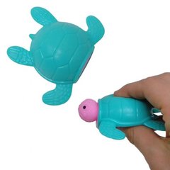 Антистрес-іграшка "Черепашка", що вистрибує (бірюзова)
