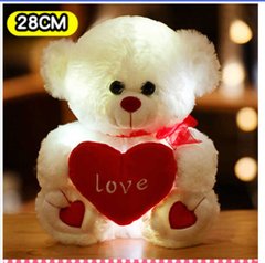 М`яка іграшка C 62304 (100) “Ведмедик з серцем”, підсвічування, від батарейок, висота 23 см, без пакета купити в Україні