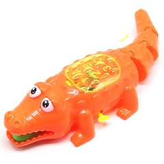 Заводна іграшка "Крокодил", 31 см (помаранчевий) купити в Україні